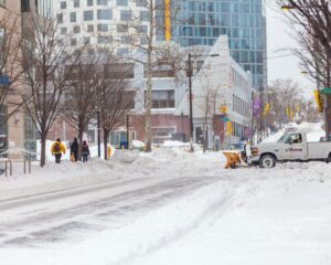 a city street covered in snow